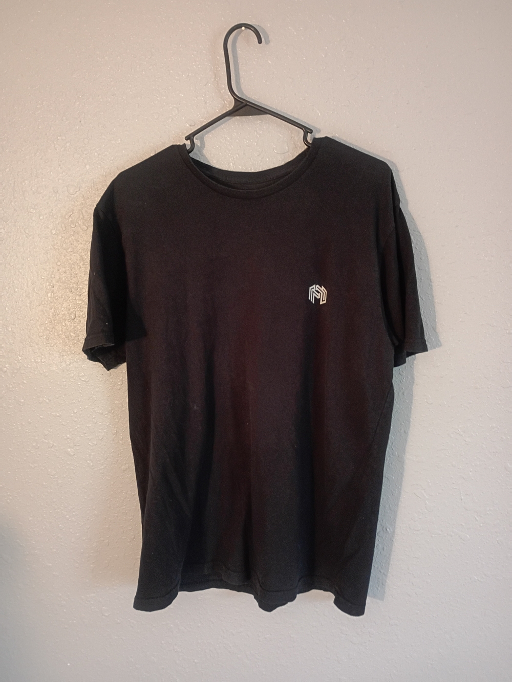 Men's Black Short-Sleeve Crew Neck Tee with Subtle Chest Emblem
